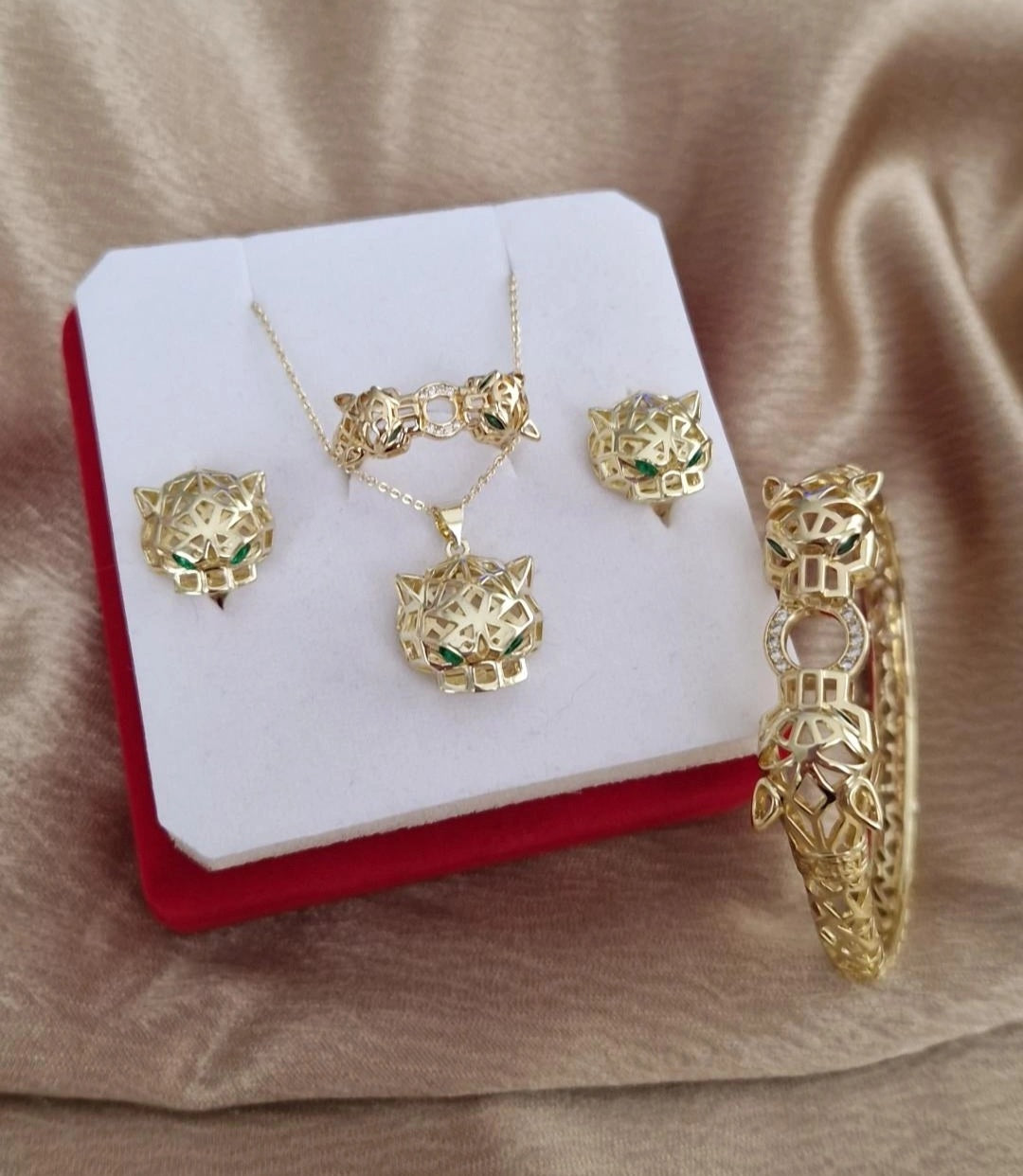 Ensemble Collier + jonc + bague + boucles d'oreilles assorties beldi Jaguar