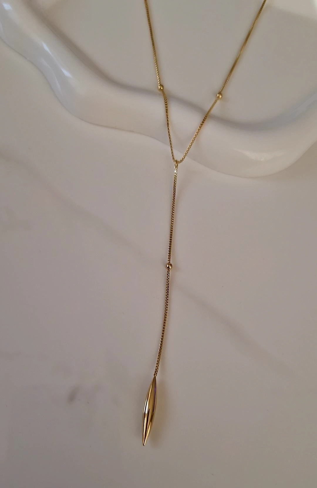 Collier en acier inoxydable en Y avec pendant doré