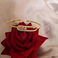 Bracelet jonc en acier inoxydable ovales et 3 strass