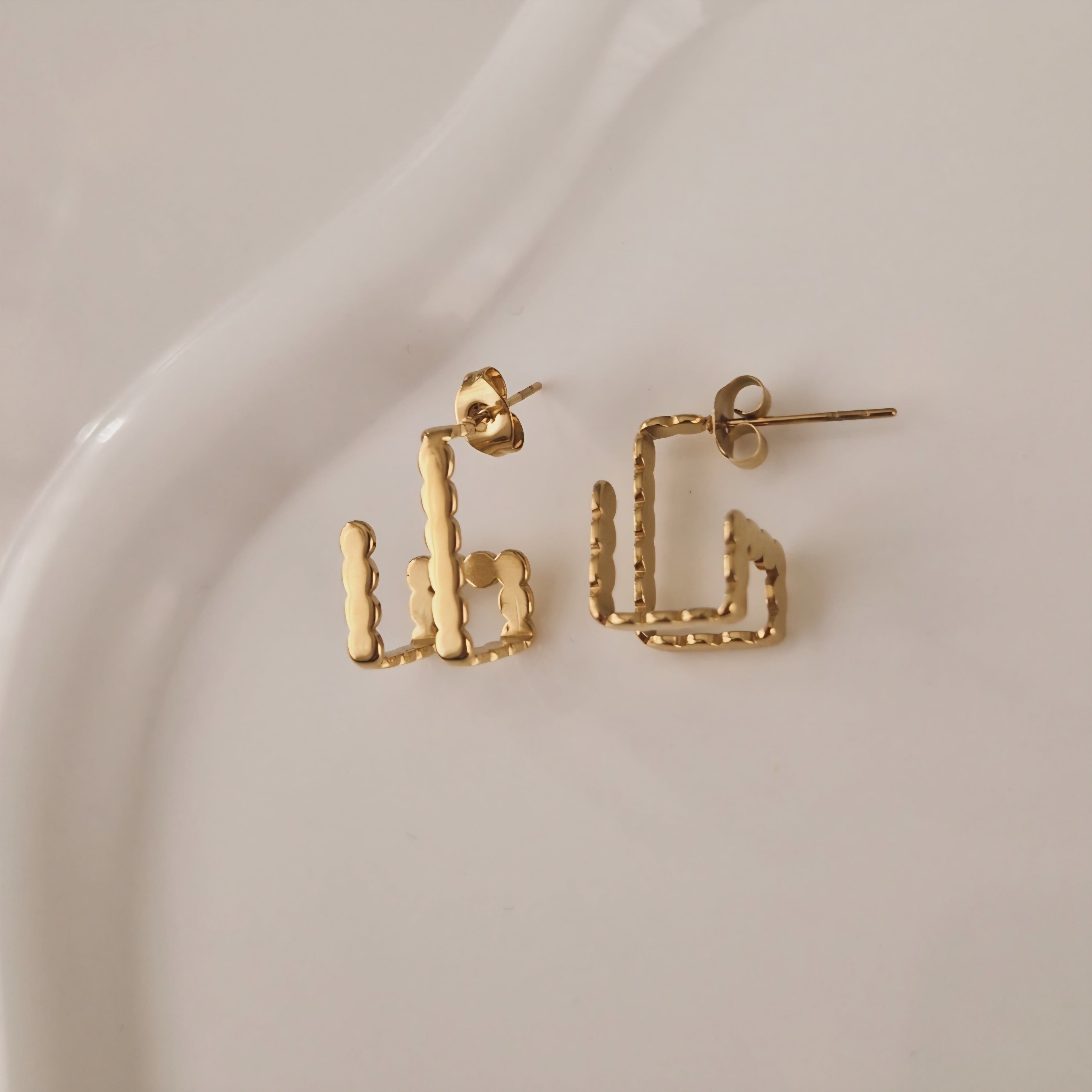 Boucles d'oreille en acier inoxydable doubles lignes