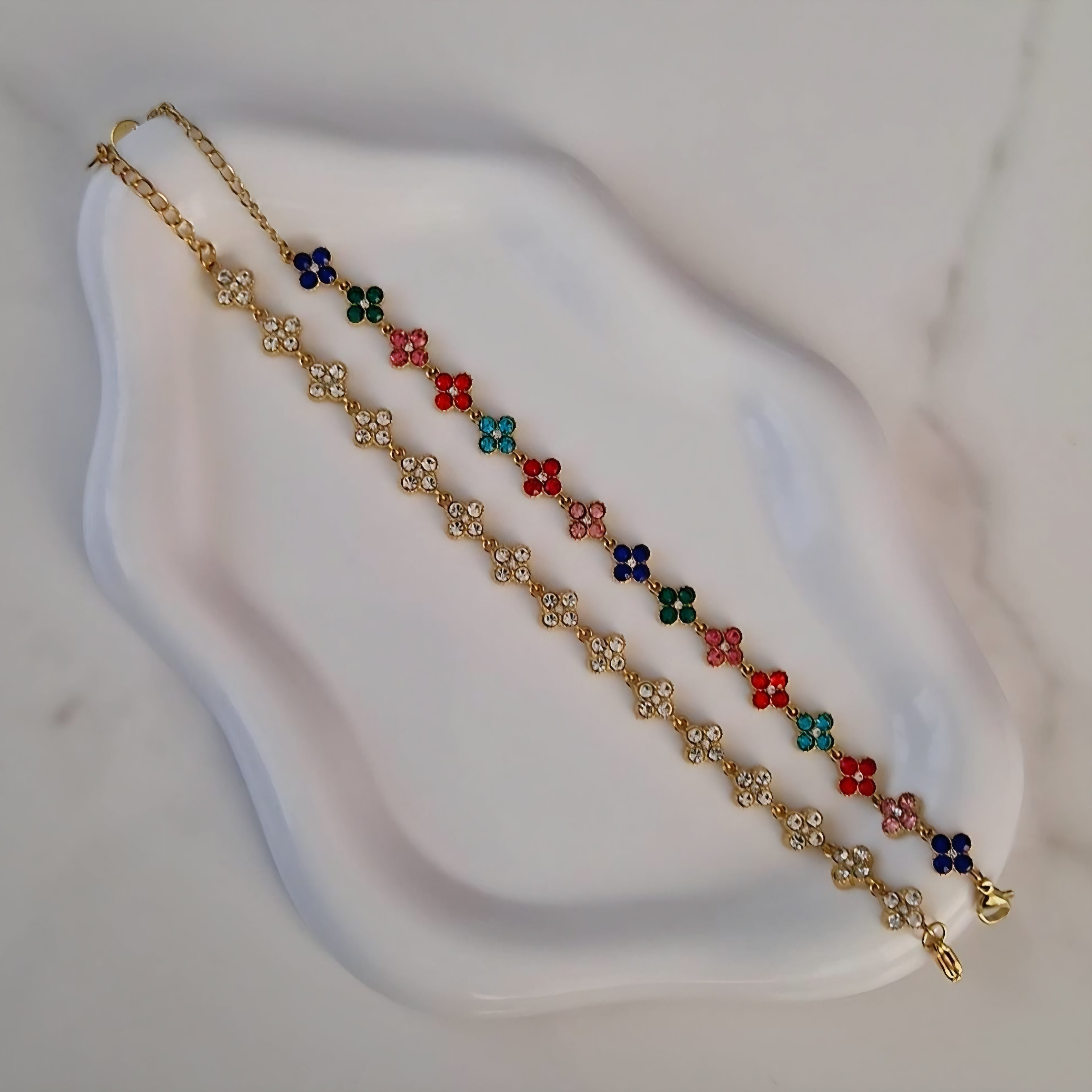 Bracelet en acier inoxydable avec fleurs multi strass