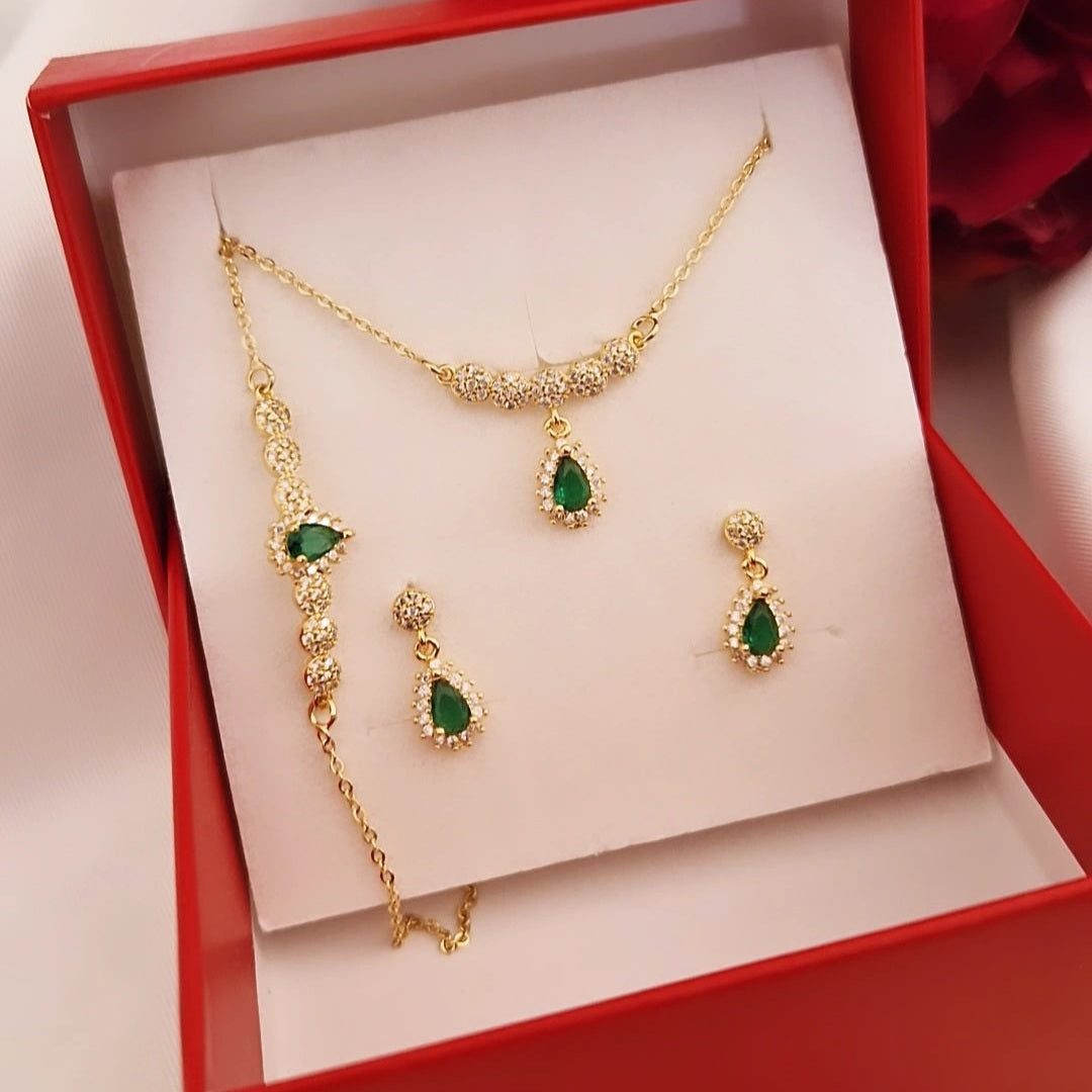 Ensemble parure collier bracelet et boucles d’oreilles style gouttes et strass