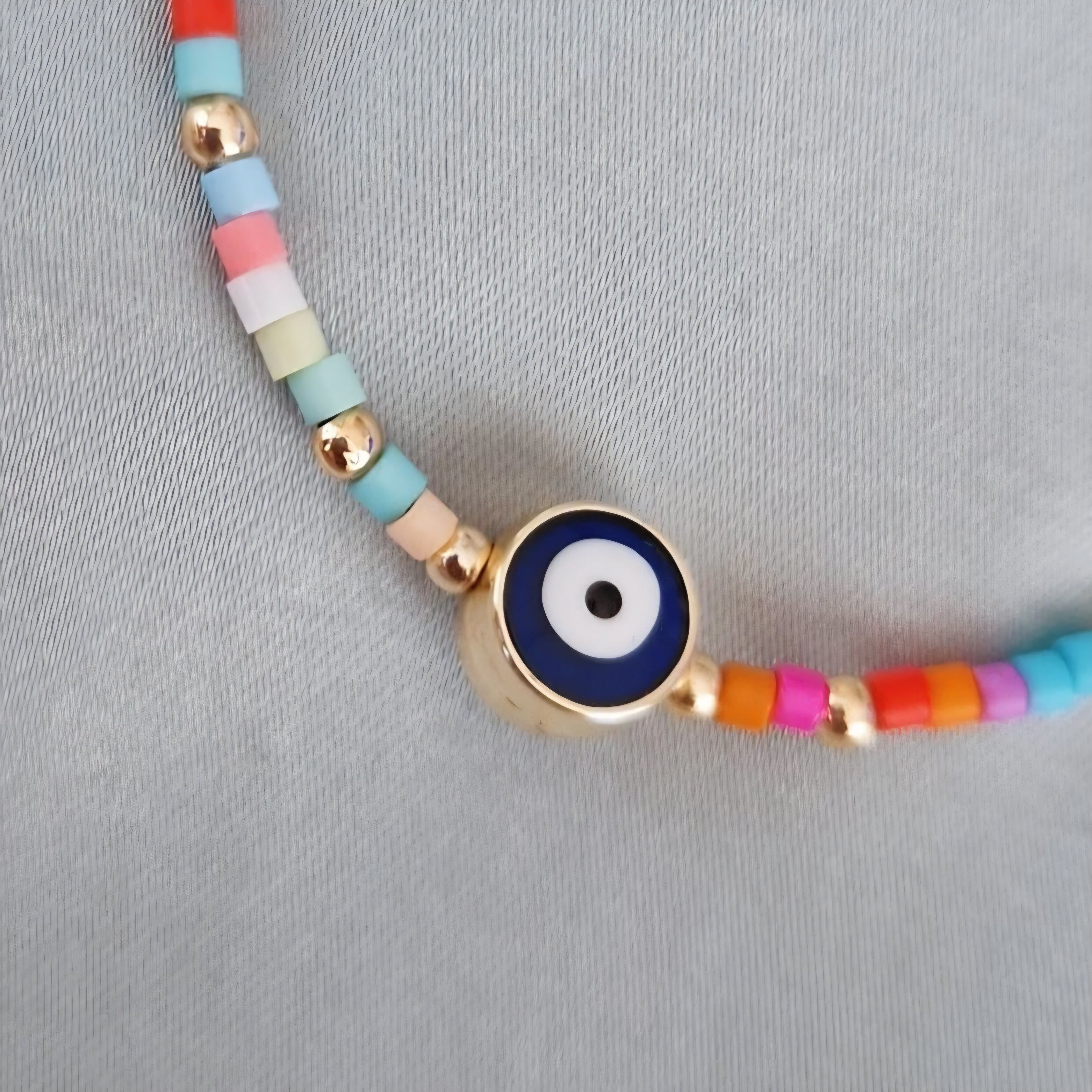 Bracelet fantaisie perles multicolores œil