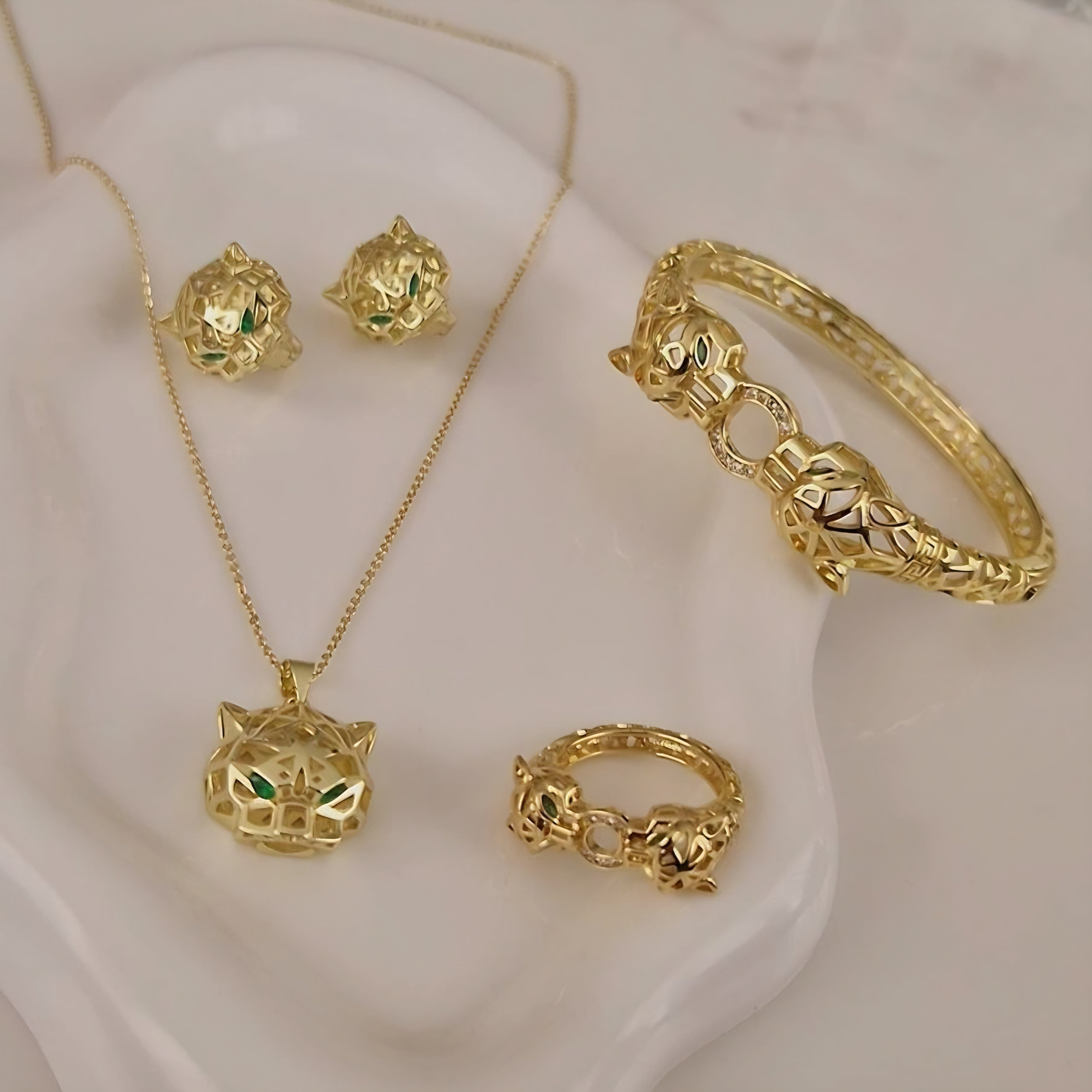 Ensemble Collier + jonc + bague + boucles d'oreilles assorties beldi Jaguar