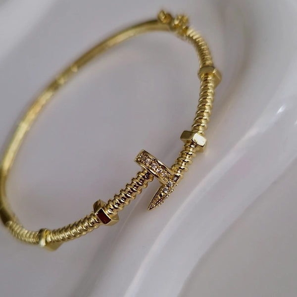 Bracelet jonc cranté et strass (à l'unité)