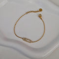 Bracelet en acier inoxydable ovale et strass