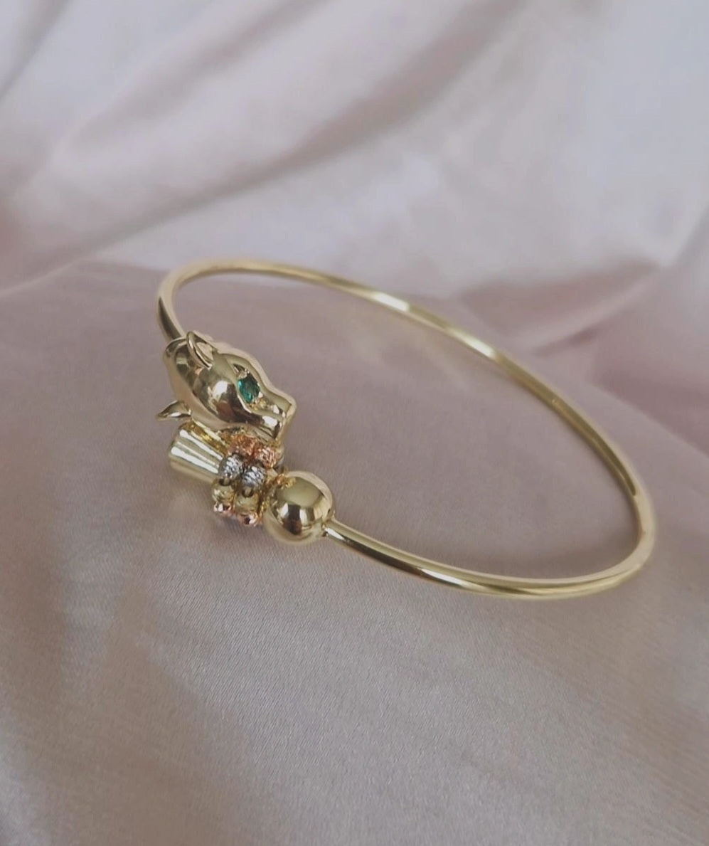 Bracelet jonc jaguar yeux verts et perles ajustable