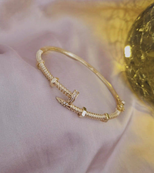 Bracelet jonc cranté et strass (à l'unité)