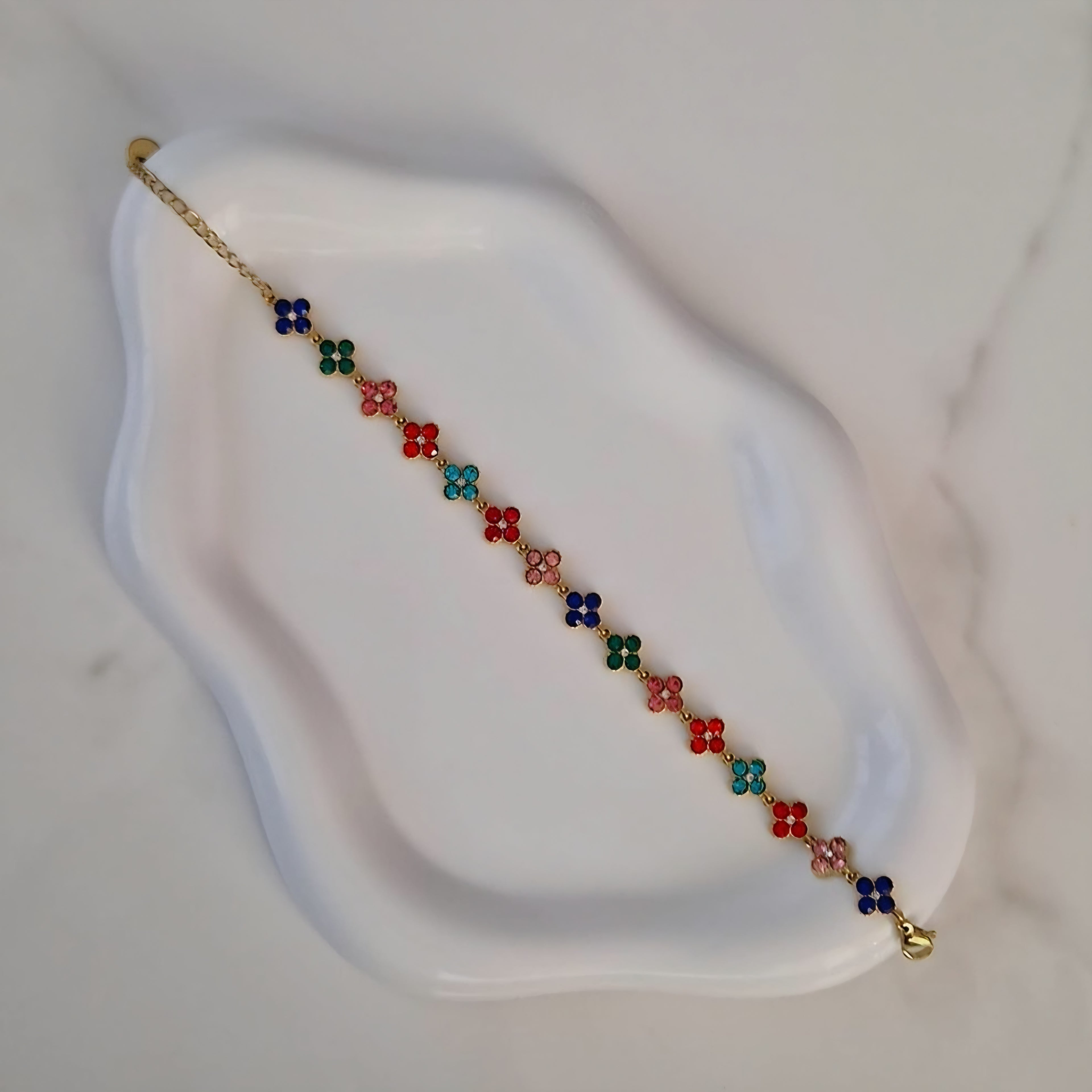 Bracelet en acier inoxydable avec fleurs multi strass colorés