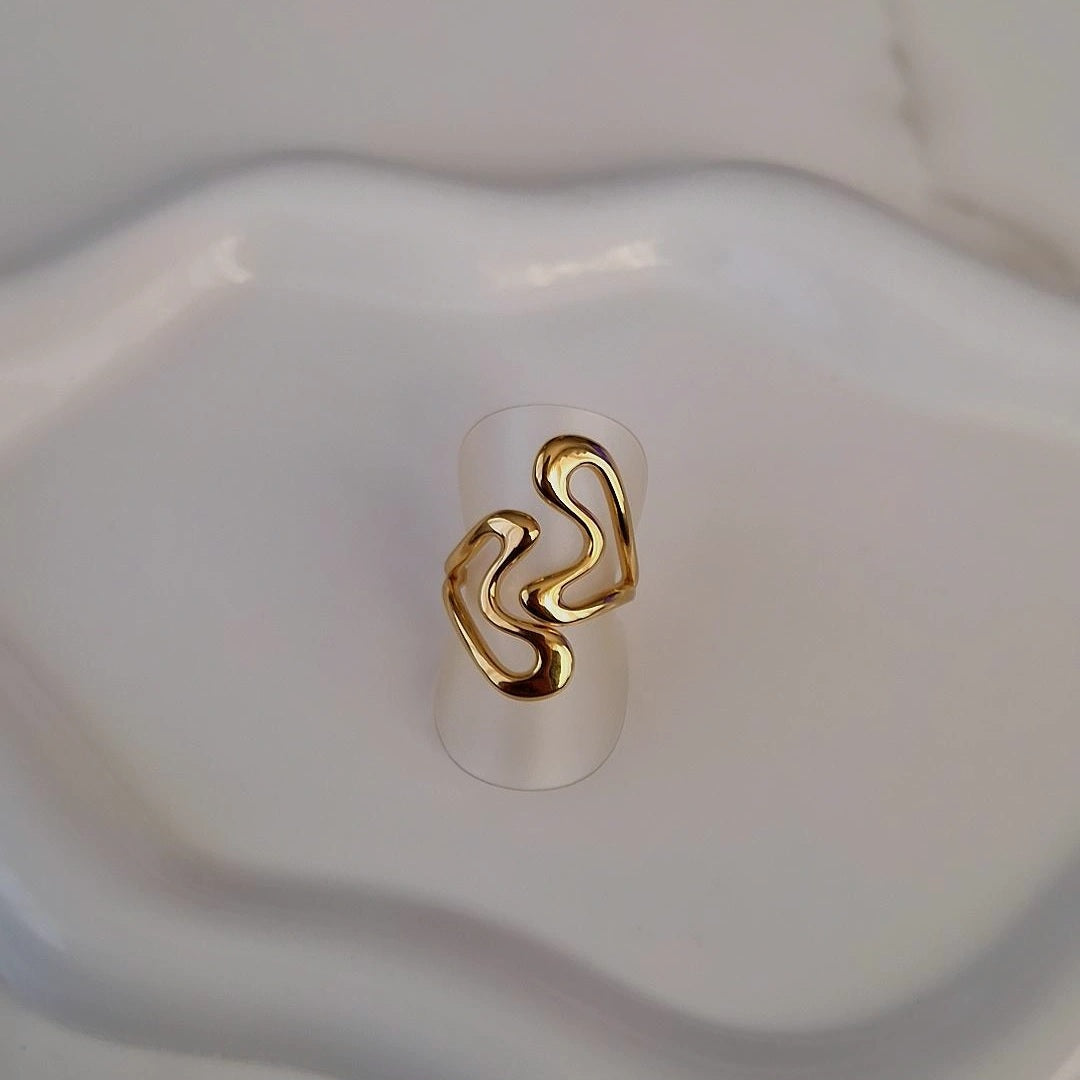 Bague ajustable en acier inoxydable ajourée courbes