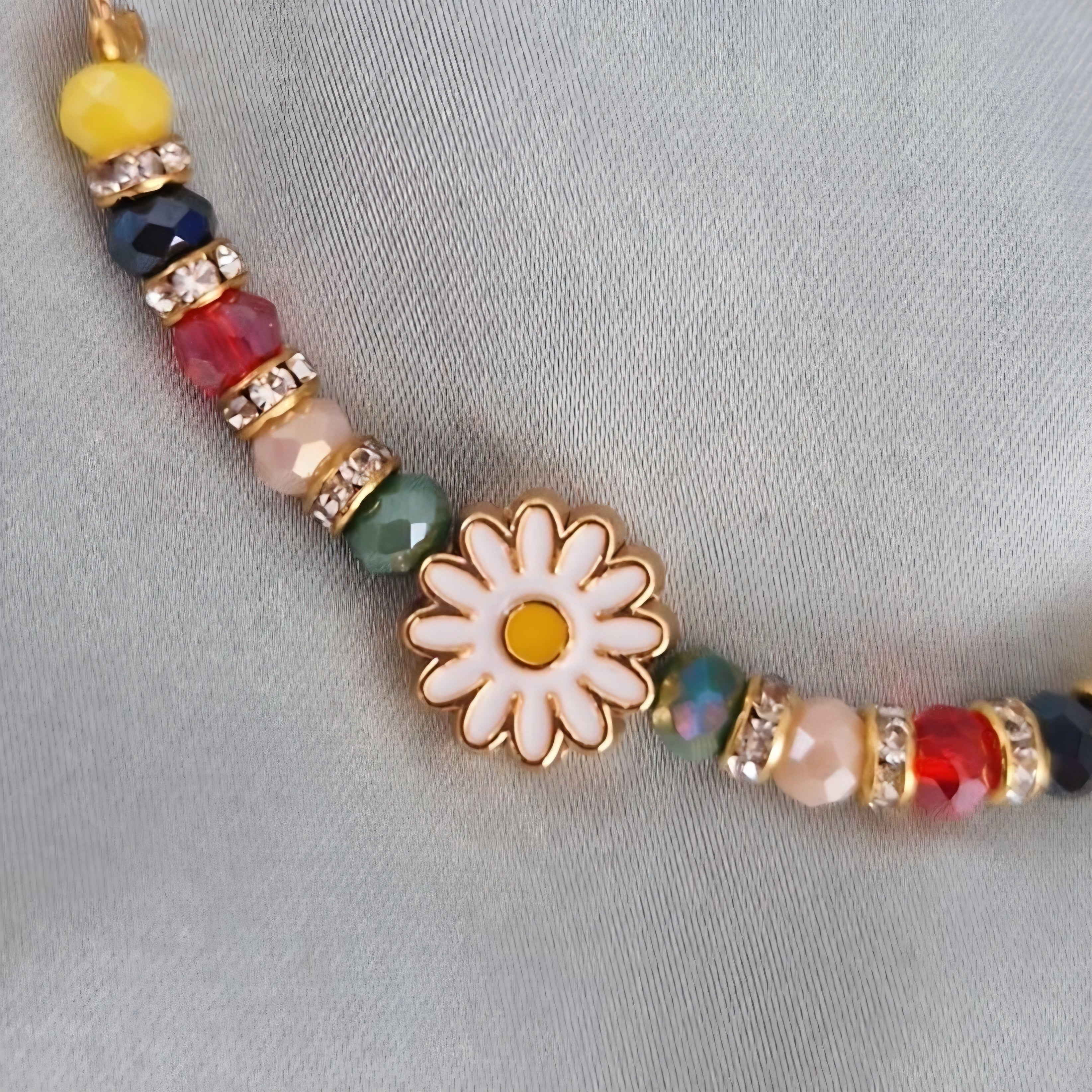 Bracelet fantaisie perles multicolores et Marguerite