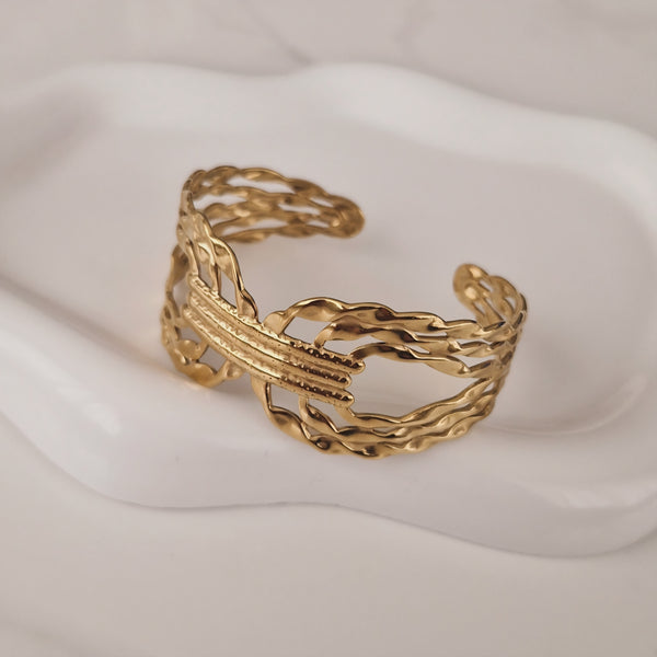 Bracelet jonc en acier inoxydable lignes enlacées