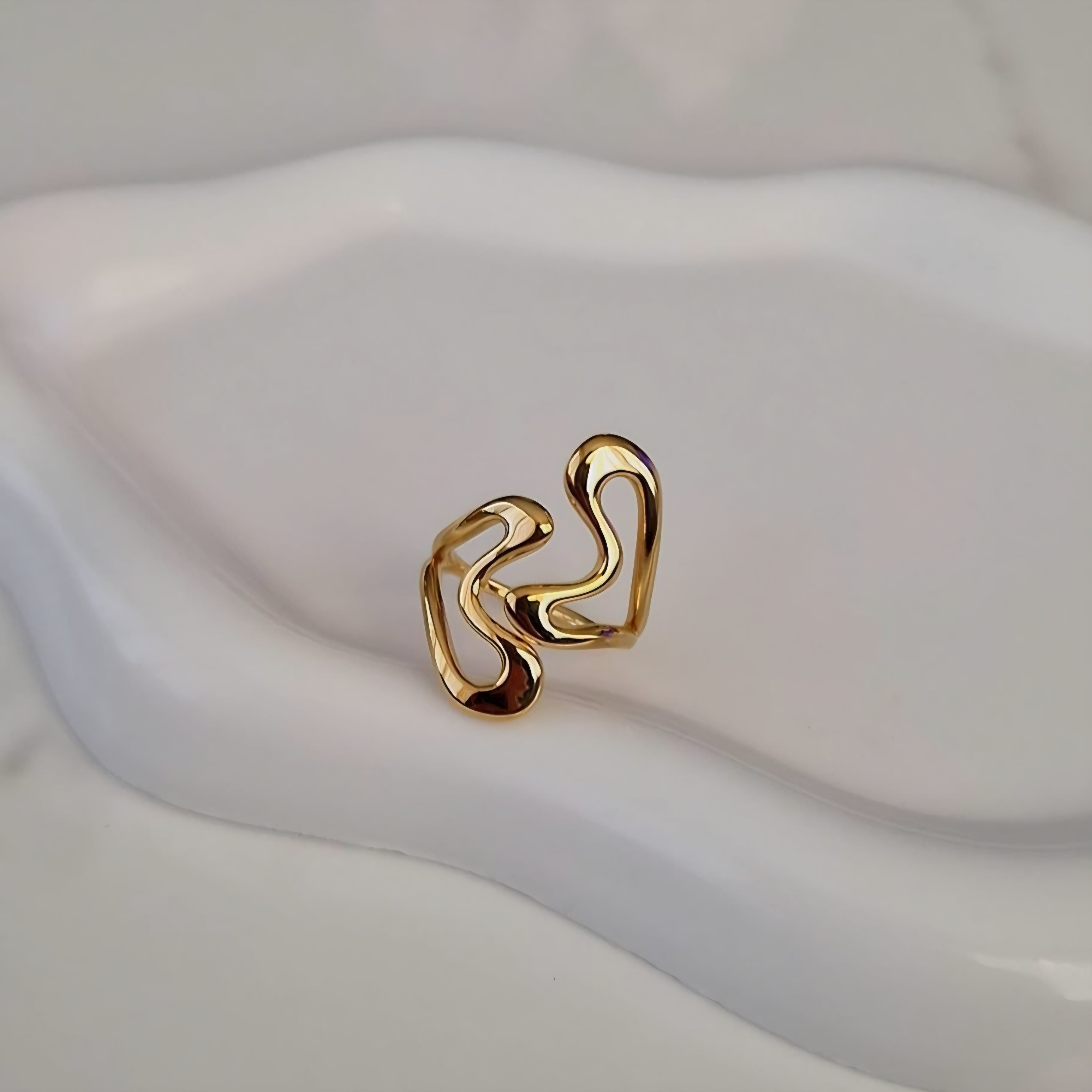 Bague ajustable en acier inoxydable ajourée courbes