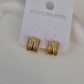 Boucles d'oreille en acier inoxydable effet multi trous avec strass