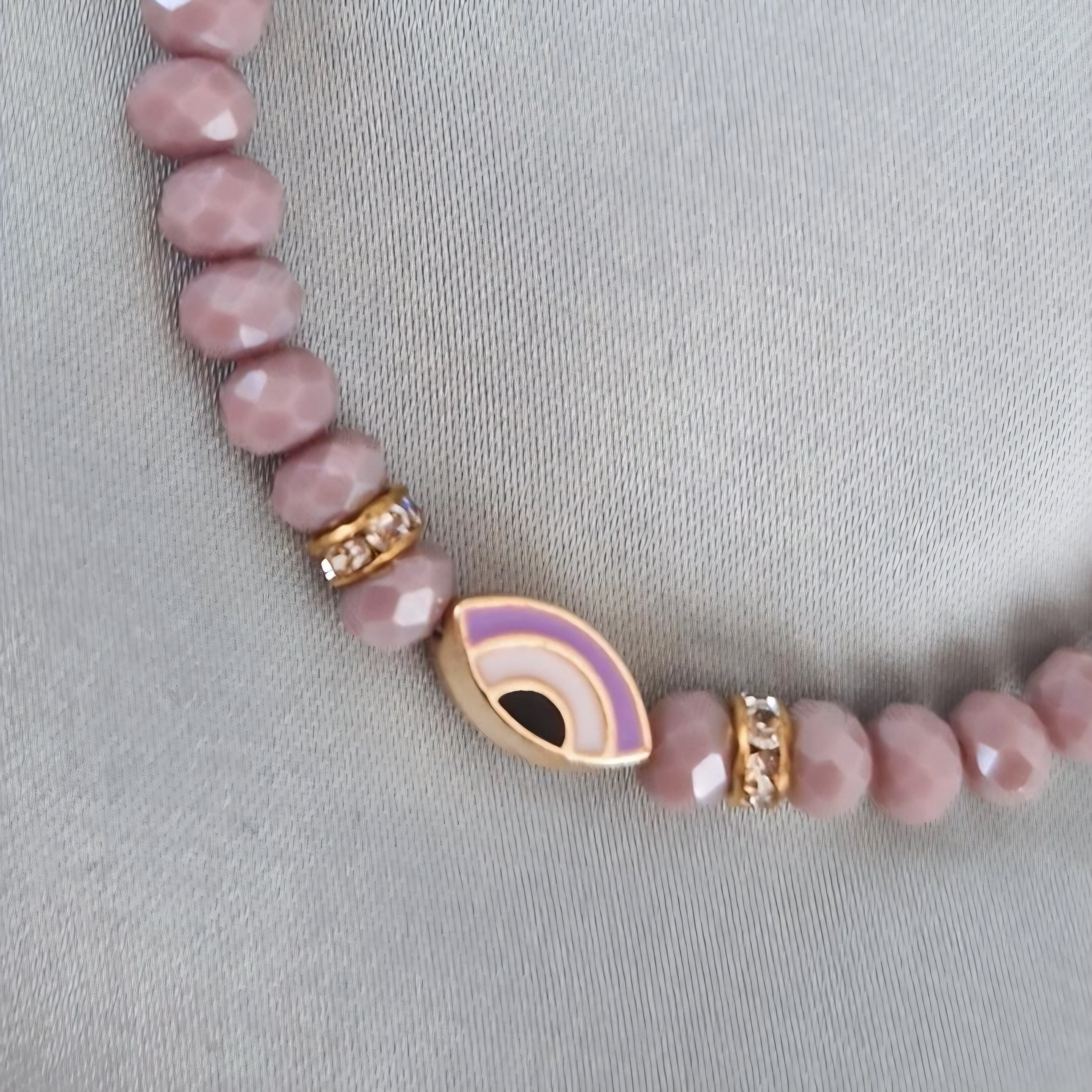Bracelet fantaisie perles violettes œil