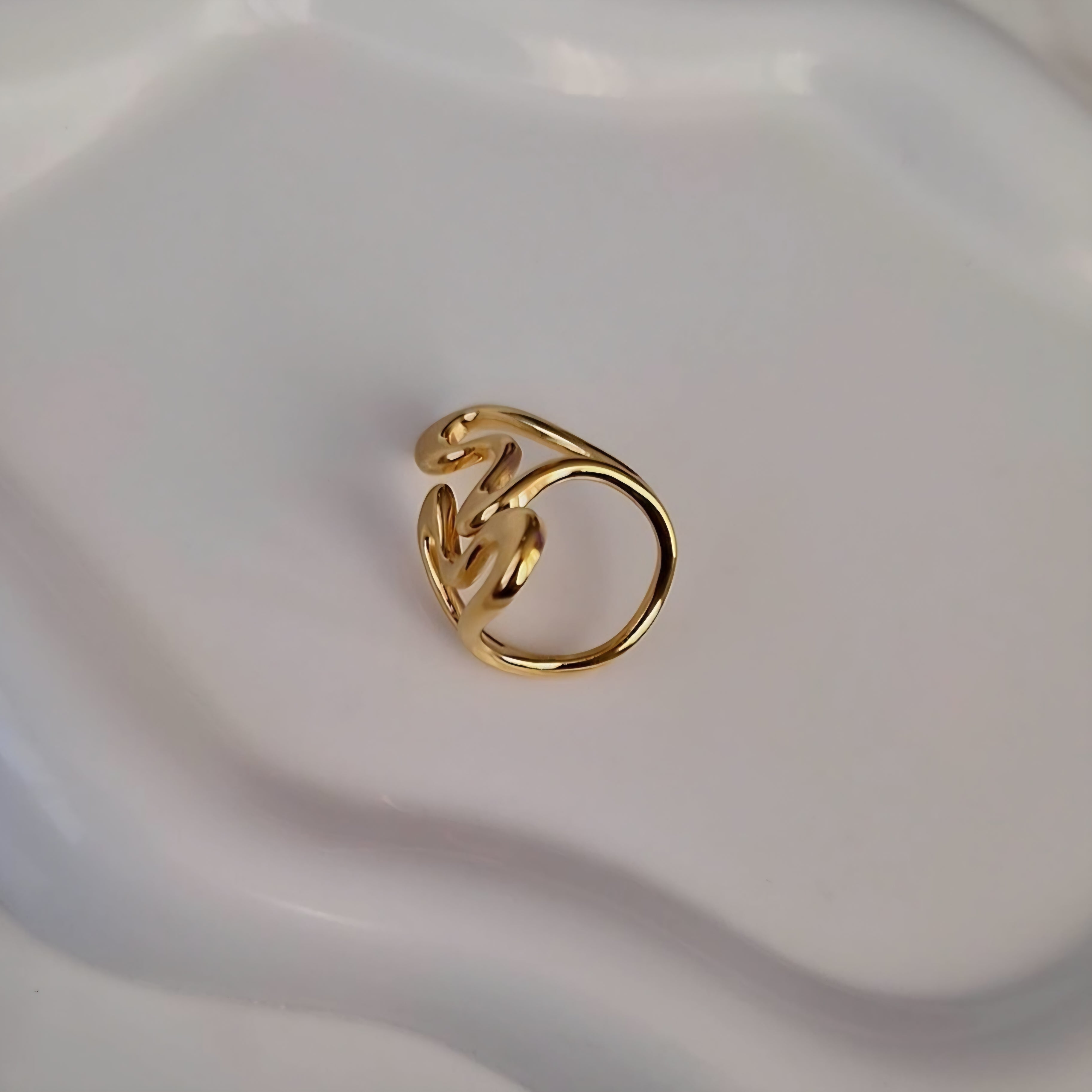 Bague ajustable en acier inoxydable ajourée courbes